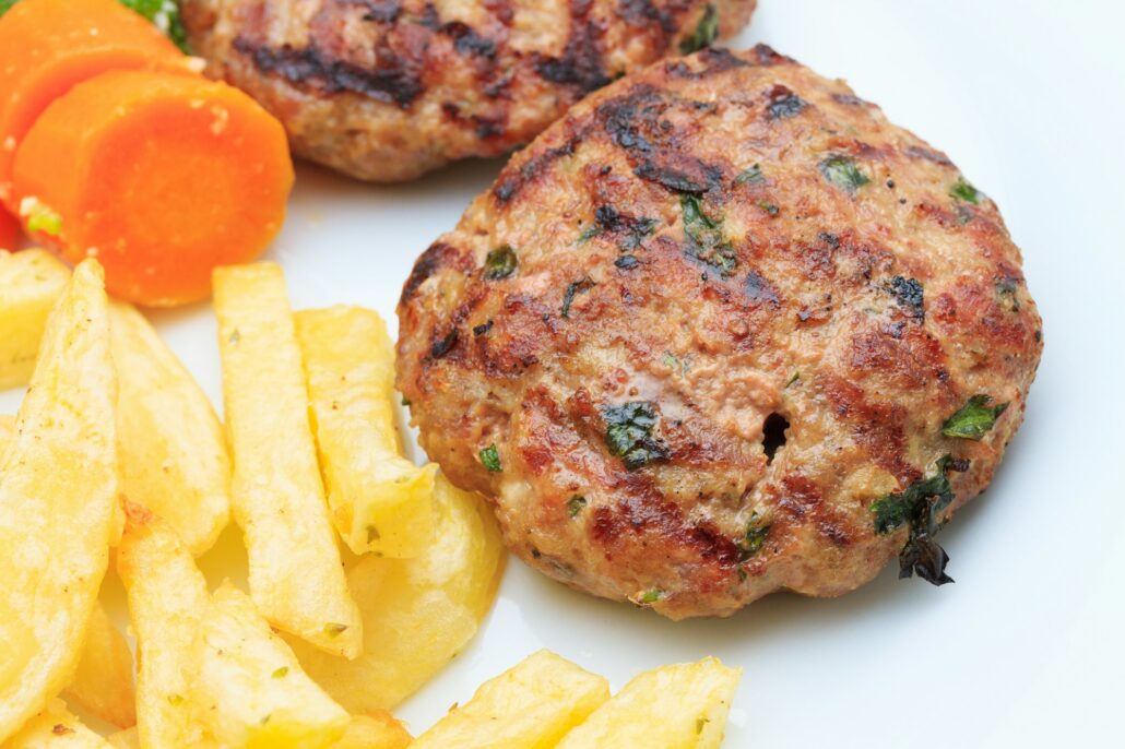 Bifteki with fries and vegetables