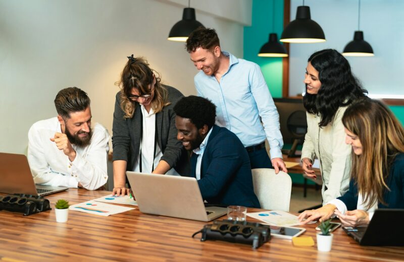 Business team of diverse people working together inside modern office - Entrepreneurship concept