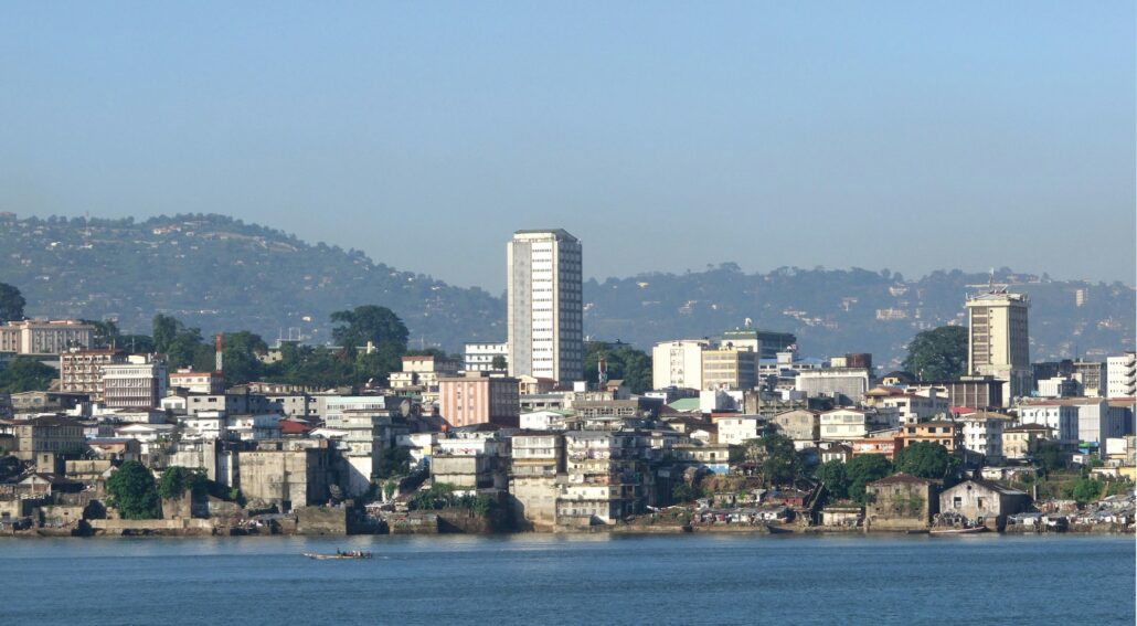 Drone shot of residential buildings in the Freetown harbor in Sierra Leone