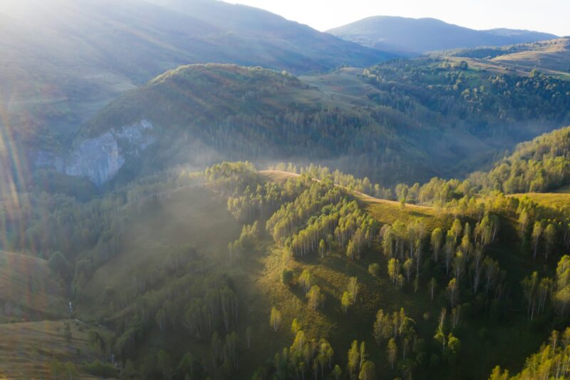 Drone view of beautiful summer sunrise over Transylvanian mountains.