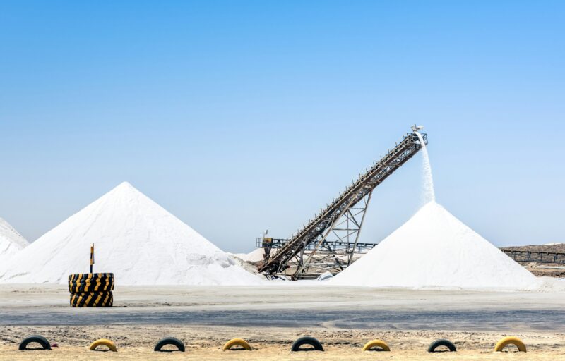 Industrial salt refinery with operating conveyor belt - Emerging industries area in Namibia