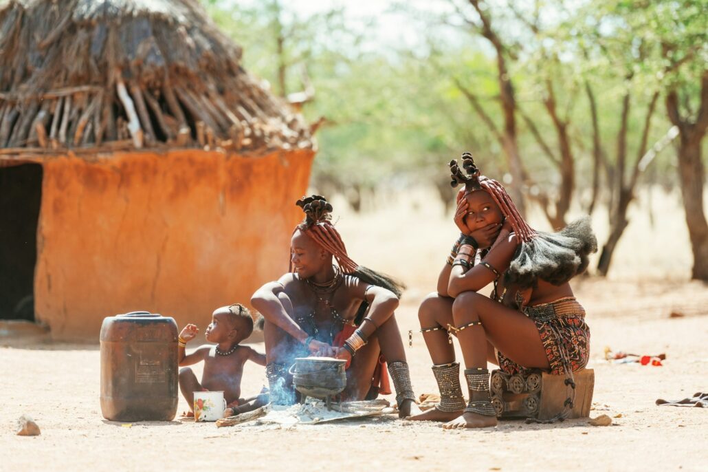 Namibia, Africa - June 14, 2021: Ethnic people, women are together near old styled home