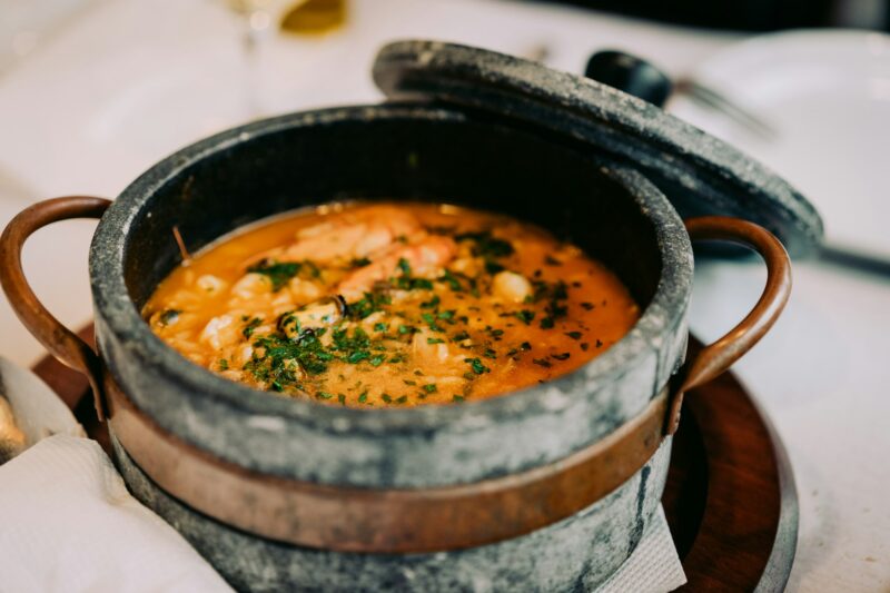 National cuisine of Cape Verde: Cachupa in traditional stone bowl