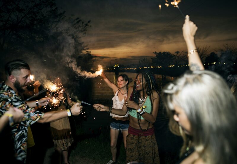 People Enjoying Sparkler in Festival Event