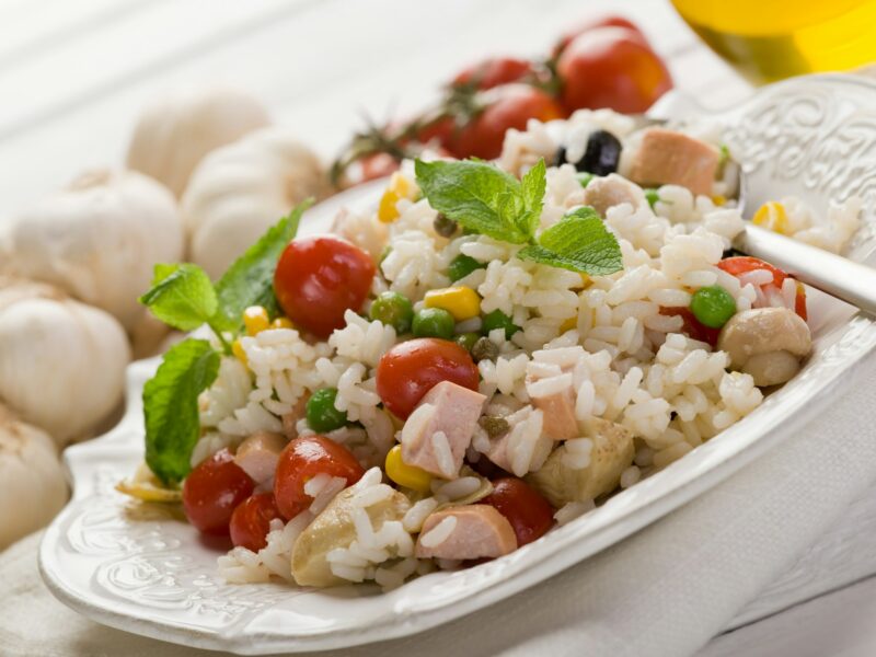 rice salad with fresh tomatoes on dish