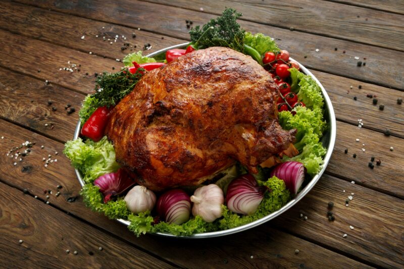 Roasted pork shoulder with vegetables, meat dish
