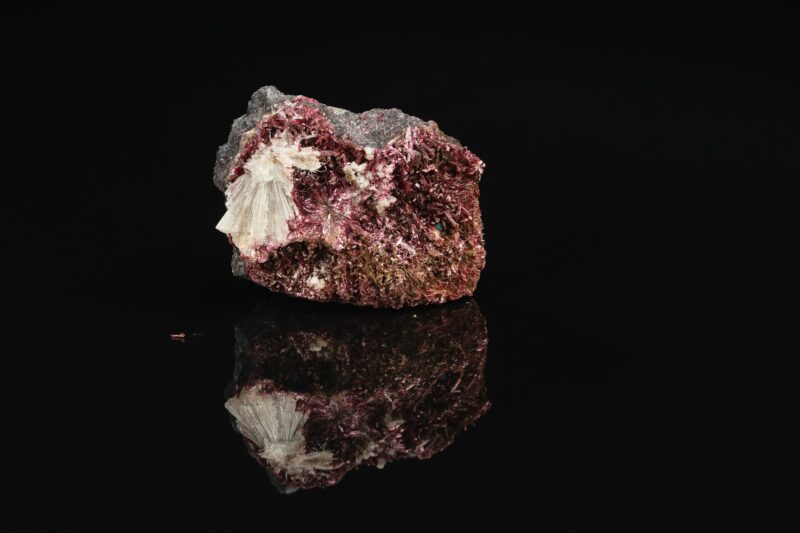 Rough Crimson Erythrite Mineral Stone on Black