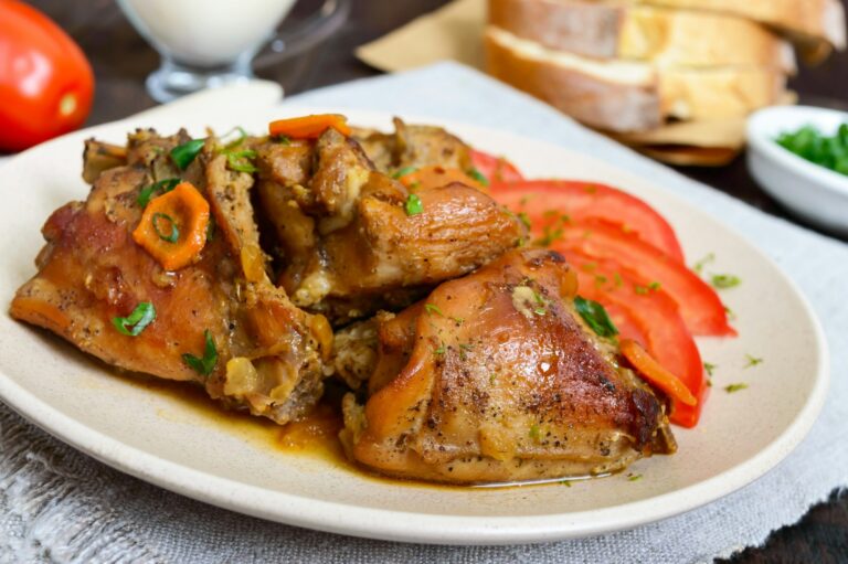 Stewed rabbit pieces with fresh tomato