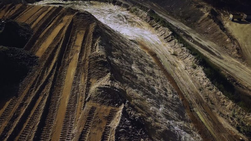 Top view of sand quarry, mining of natural resources or ore, heavy industry concept. Stock footage