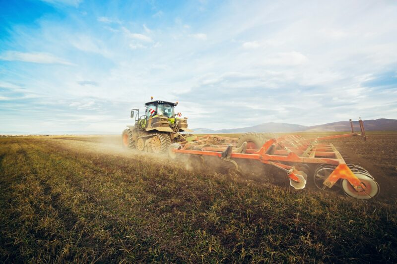 Tractor preparing the land for planting