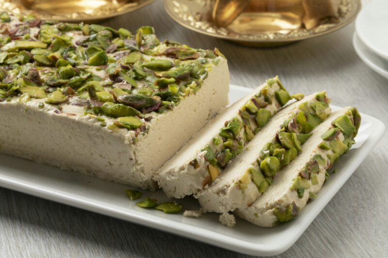 Traditional Turkish pistachio halva and slices